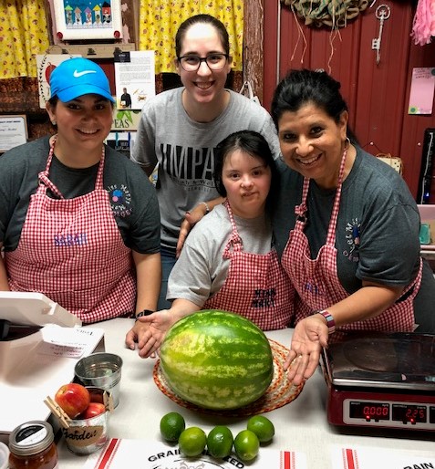 Miss Mary's Market and Lacie from Impact showing off the fresh watermelon and limes! Miss Mary's is the place to go for ingredients for the Watermelon Slushie.