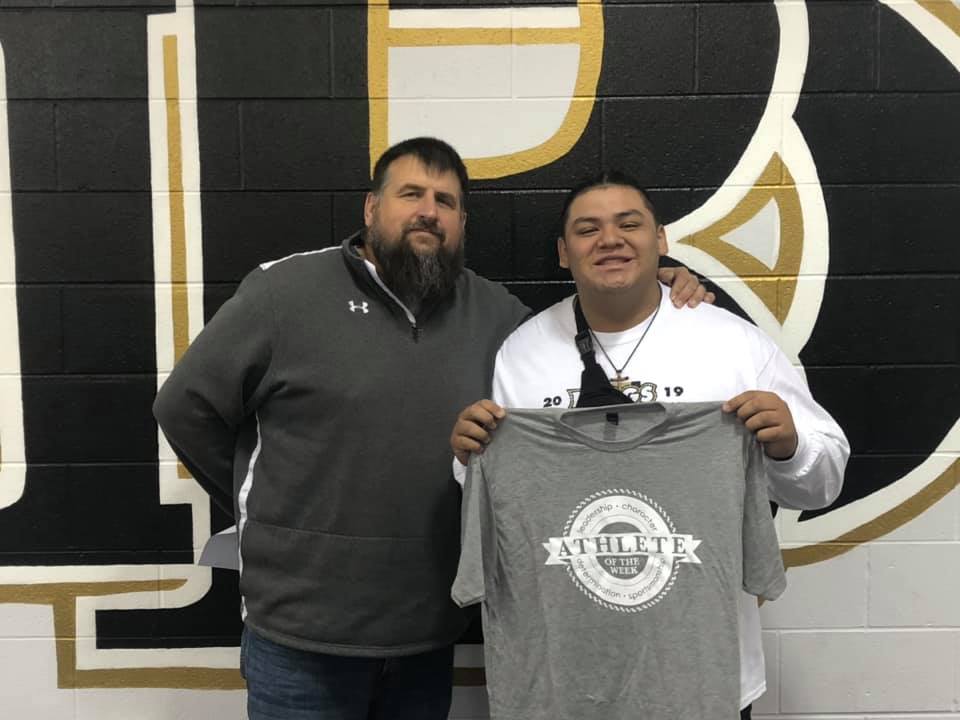 Impact Athlete of the Week, Tafv Sanders, pictured with Beggs Athletic Director, Chad Stanton.