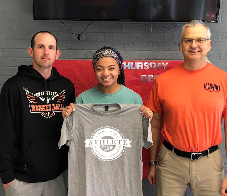 Impact Athlete of the Week winner, Jazmyn Powell, pictured with coach Ty Allen and Michael Siegenthaler.