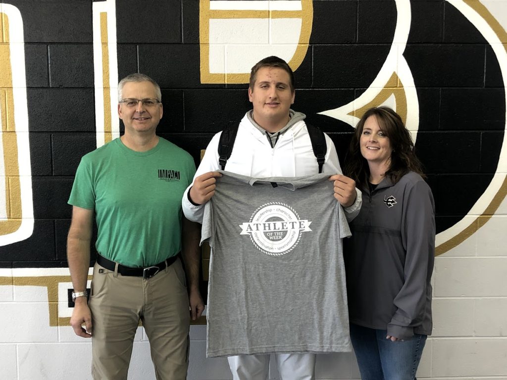 Impact Athlete of the Week winner, Kaden Stanton, pictured with high school principal and Michael Siegenthaler.