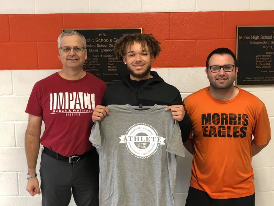 Impact Athlete of the Week, Joe McBride, pictured with his coach and Michael Siegenthaler.